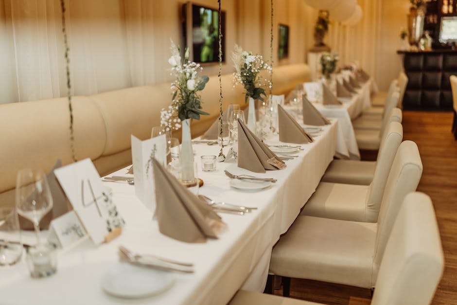 Chairs by Decorated Tables in Restaurant